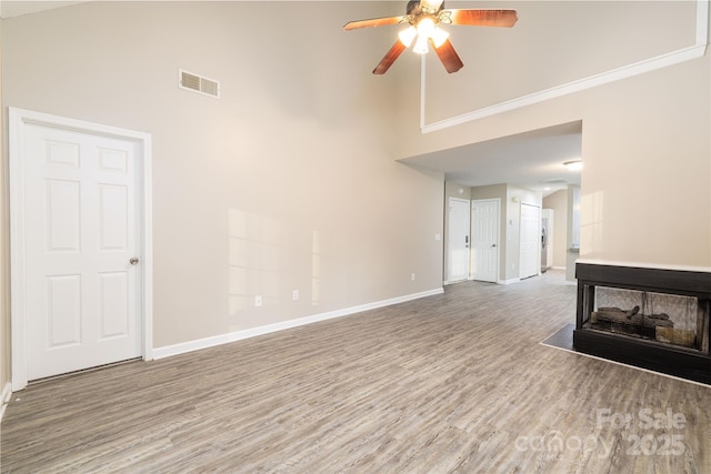 11531 Delores Ferguson Ln, Charlotte, NC 28277 - unfurnished living room featuring high vaulted ceiling, ceiling fan, and wood finished floors