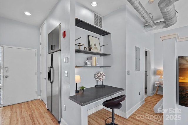 514 W 10th St Unit 302, Charlotte, NC 28202 - hall with an office area, light wood-style flooring, and electric panel