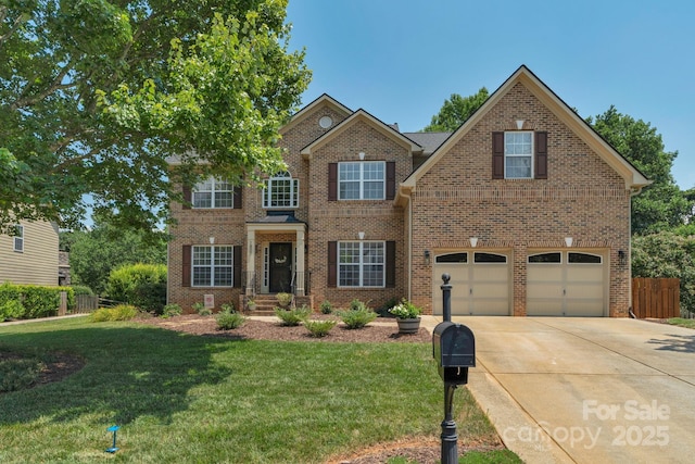 1807 Robbins Meadows Dr, Waxhaw, NC 28173 - traditional-style home with driveway, an attached garage, and brick siding