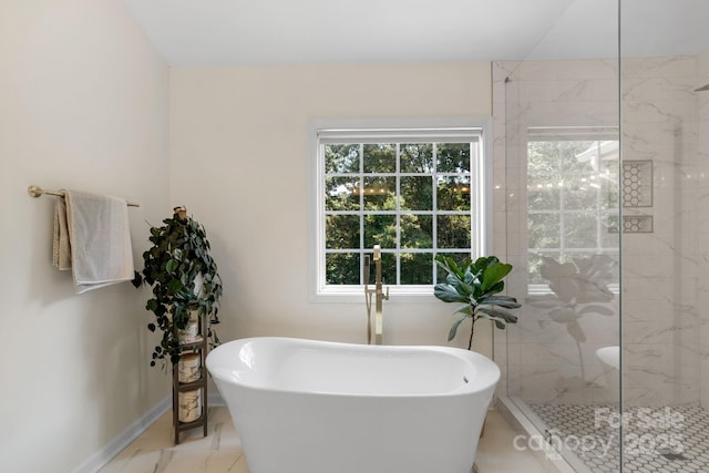 1807 Robbins Meadows Dr, Waxhaw, NC 28173 - full bath featuring a freestanding bath, a marble finish shower, and marble finish flooring