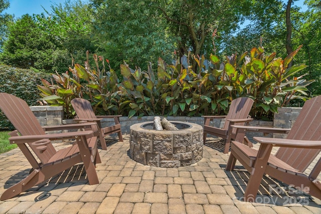 1807 Robbins Meadows Dr, Waxhaw, NC 28173 - view of patio / terrace with a fire pit