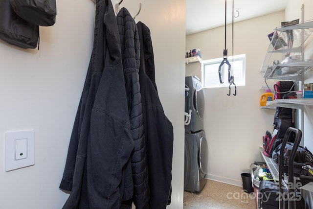 2116 Mcclintock Rd Unit 122, Charlotte, NC 28205 - washroom featuring stacked washer / dryer and light carpet