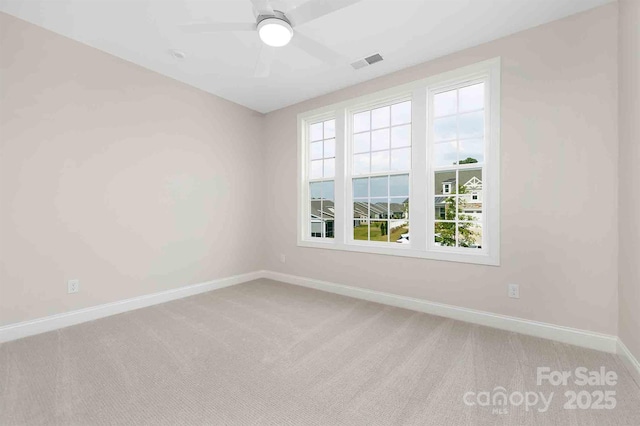 1074 Wylie Falls Ln, York, SC 29745 - empty room featuring light colored carpet and a ceiling fan