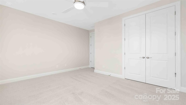 1074 Wylie Falls Ln, York, SC 29745 - unfurnished bedroom with carpet, a closet, and a ceiling fan