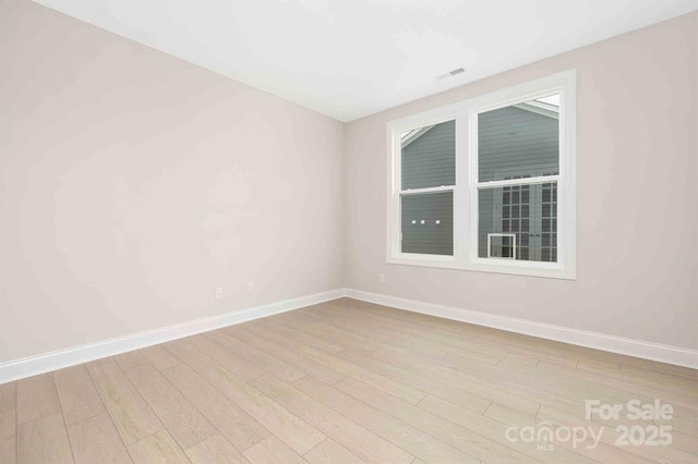 1074 Wylie Falls Ln, York, SC 29745 - empty room featuring wood finished floors