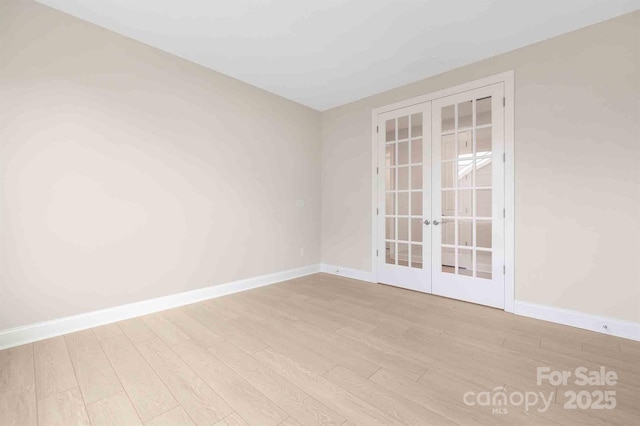 1074 Wylie Falls Ln, York, SC 29745 - spare room with french doors and wood finished floors