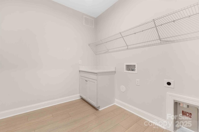 1074 Wylie Falls Ln, York, SC 29745 - washroom featuring hookup for an electric dryer, washer hookup, light wood-type flooring, and gas dryer hookup