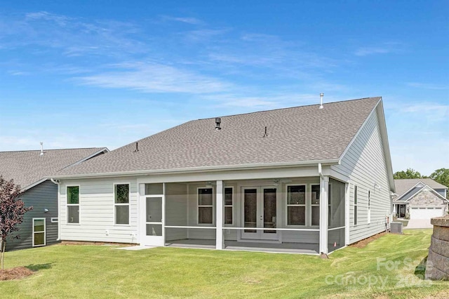 1074 Wylie Falls Ln, York, SC 29745 - rear view of house featuring french doors, a lawn, roof with shingles, and a sunroom