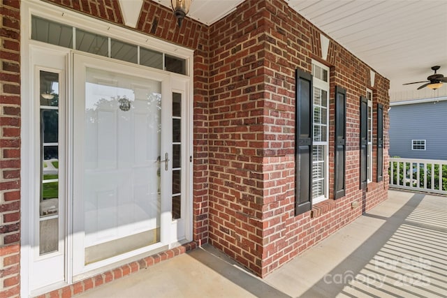 2411 Stoney Run Dr Unit 13, Oakboro, NC 28129 - property entrance with brick siding, covered porch, and ceiling fan
