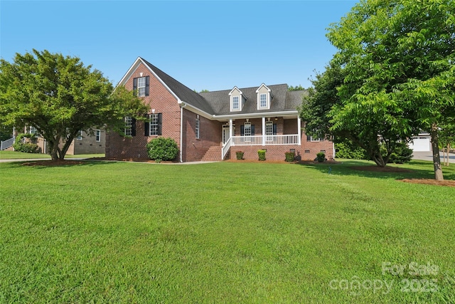 2411 Stoney Run Dr Unit 13, Oakboro, NC 28129 - view of front facade with a porch, brick siding, and a front yard