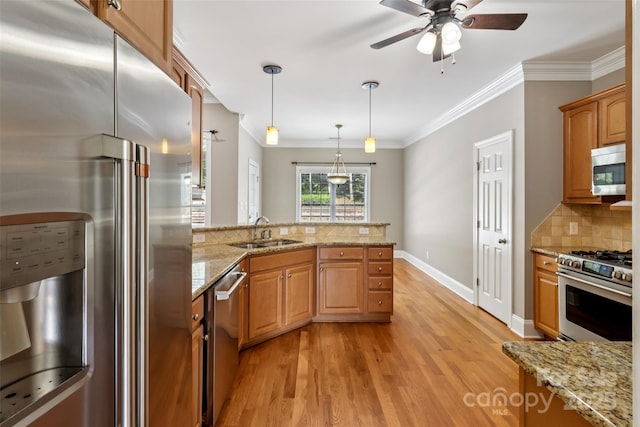 2411 Stoney Run Dr Unit 13, Oakboro, NC 28129 - kitchen with stainless steel appliances, ornamental molding, light wood-style floors, tasteful backsplash, and ceiling fan