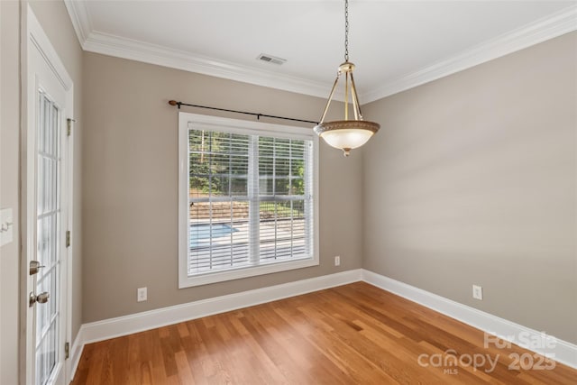2411 Stoney Run Dr Unit 13, Oakboro, NC 28129 - spare room featuring crown molding and wood finished floors