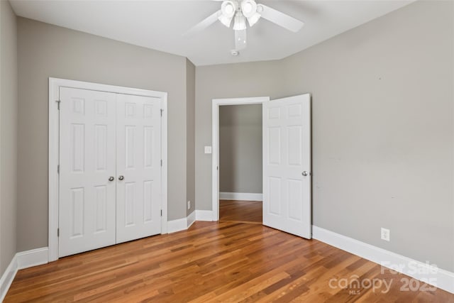 2411 Stoney Run Dr Unit 13, Oakboro, NC 28129 - unfurnished bedroom featuring light wood finished floors, a closet, and a ceiling fan
