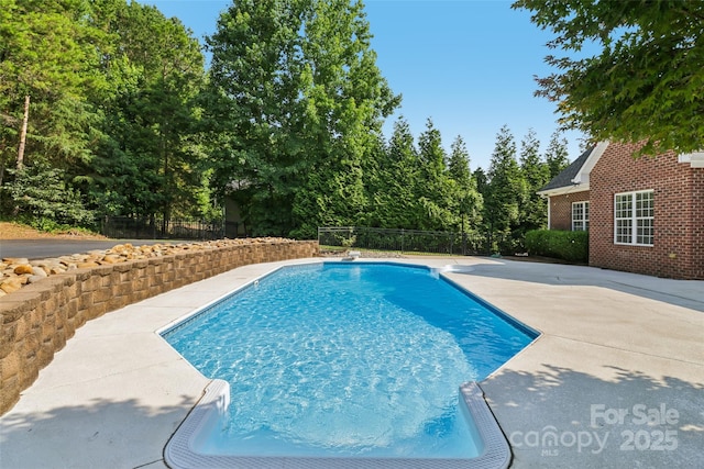 2411 Stoney Run Dr Unit 13, Oakboro, NC 28129 - view of swimming pool featuring a patio