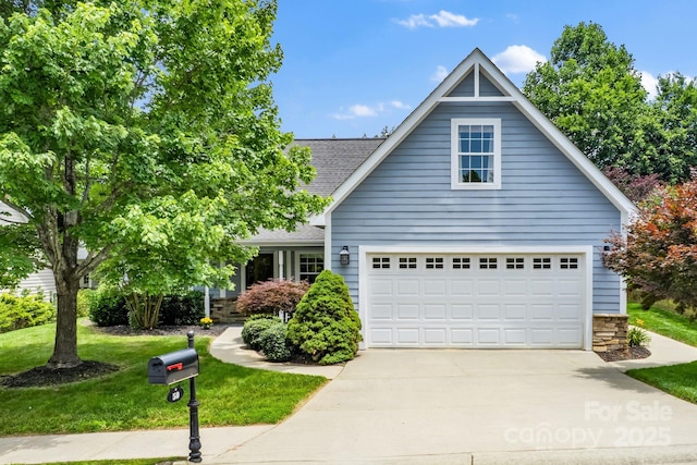 50 Grove End Rd, Fletcher, NC 28732 - traditional-style house with a shingled roof, concrete driveway, a front yard, and stone siding