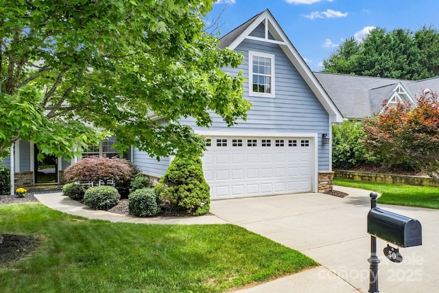 50 Grove End Rd, Fletcher, NC 28732 - view of front of home with stone siding, driveway, and a front lawn