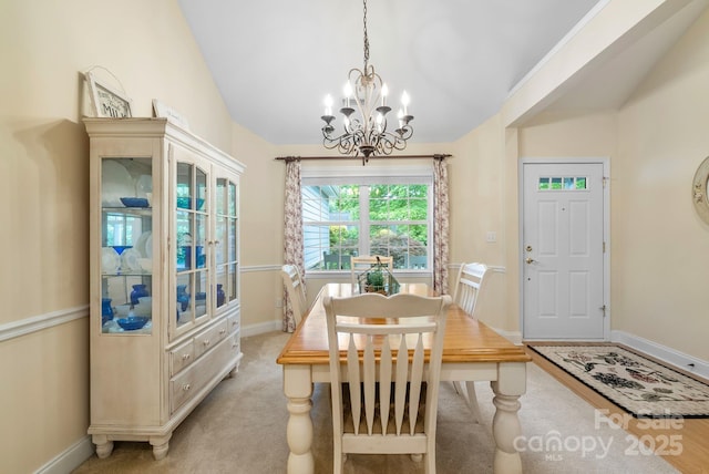 50 Grove End Rd, Fletcher, NC 28732 - dining room featuring a chandelier, light carpet, and lofted ceiling