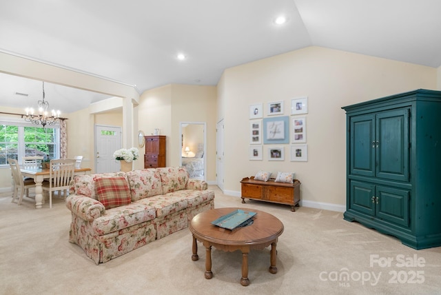 50 Grove End Rd, Fletcher, NC 28732 - living room featuring light colored carpet, vaulted ceiling, a chandelier, and recessed lighting