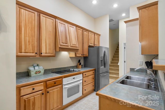50 Grove End Rd, Fletcher, NC 28732 - kitchen featuring white oven, stainless steel fridge, black electric cooktop, and recessed lighting