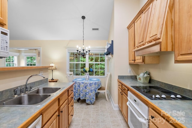 50 Grove End Rd, Fletcher, NC 28732 - kitchen with white appliances, a chandelier, healthy amount of natural light, pendant lighting, and vaulted ceiling