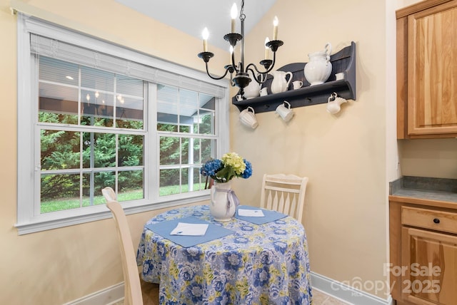50 Grove End Rd, Fletcher, NC 28732 - dining space featuring a chandelier and baseboards