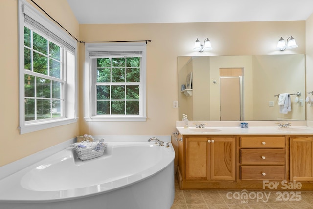 50 Grove End Rd, Fletcher, NC 28732 - bathroom with a garden tub, double vanity, a stall shower, and tile patterned flooring