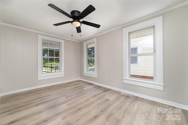 105 Mcgill Ave NW, Concord, NC 28025 - spare room with light wood-type flooring, ornamental molding, and ceiling fan