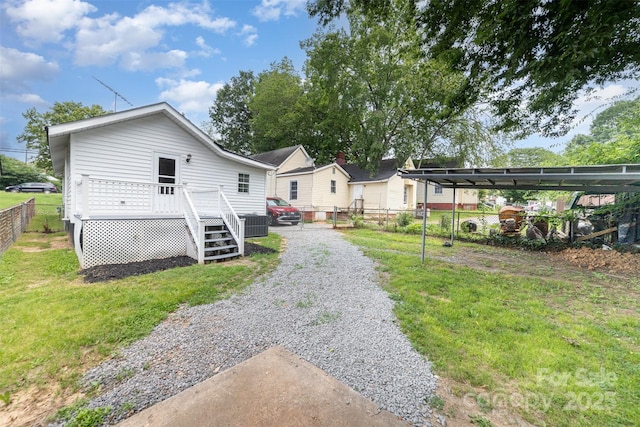 105 Mcgill Ave NW, Concord, NC 28025 - back of house with a deck
