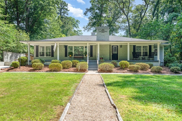 304 W Colonial Dr, Salisbury, NC 28144 - single story home with covered porch, a chimney, and brick siding