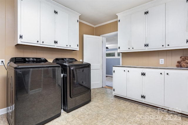 304 W Colonial Dr, Salisbury, NC 28144 - washroom featuring independent washer and dryer, cabinet space, ornamental molding, light flooring, and wood walls