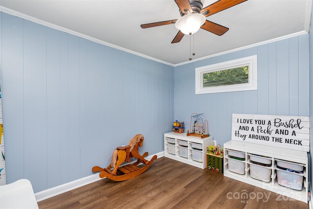 304 W Colonial Dr, Salisbury, NC 28144 - game room with dark wood-style floors, ceiling fan, and ornamental molding