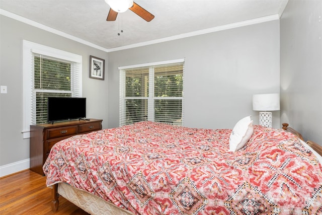 304 W Colonial Dr, Salisbury, NC 28144 - bedroom featuring wood finished floors, ornamental molding, and ceiling fan