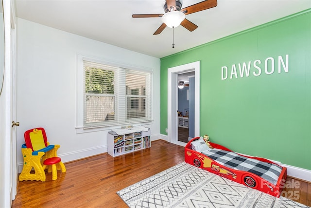 304 W Colonial Dr, Salisbury, NC 28144 - bedroom featuring wood finished floors and a ceiling fan