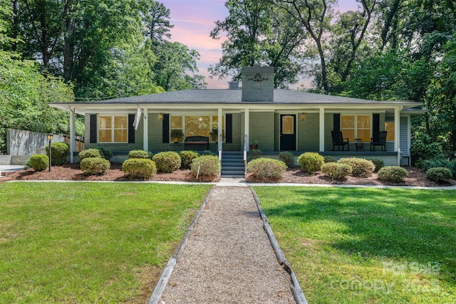 304 W Colonial Dr, Salisbury, NC 28144 - single story home featuring covered porch and a chimney