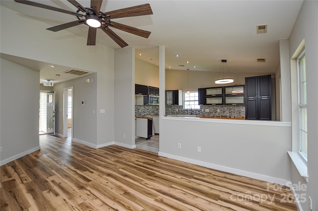 1312 Shenandoah Cir, Rock Hill, SC 29730 - unfurnished living room featuring light wood-type flooring, a ceiling fan, and recessed lighting