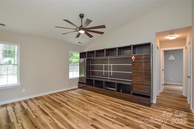 1312 Shenandoah Cir, Rock Hill, SC 29730 - unfurnished living room with wood finished floors, lofted ceiling, and a ceiling fan