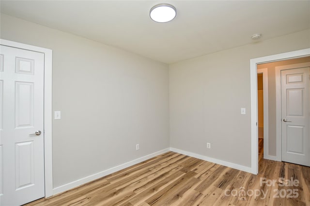 1312 Shenandoah Cir, Rock Hill, SC 29730 - empty room featuring a smoke detector and light wood-style flooring