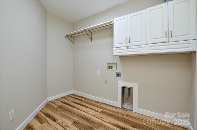 1312 Shenandoah Cir, Rock Hill, SC 29730 - laundry area featuring electric dryer hookup, washer hookup, cabinet space, light wood-type flooring, and hookup for a gas dryer