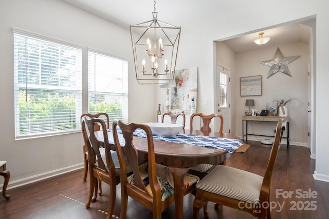 212 Fesperman Cir, Troutman, NC 28166 - dining space featuring healthy amount of natural light, wood finished floors, and a chandelier