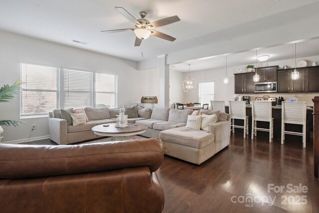212 Fesperman Cir, Troutman, NC 28166 - living room with a ceiling fan and dark wood-style flooring