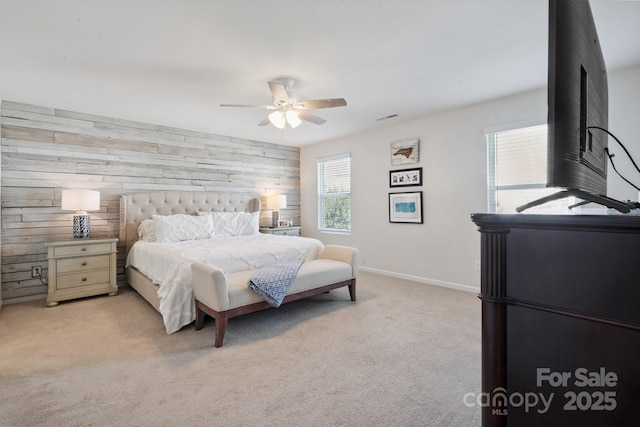 212 Fesperman Cir, Troutman, NC 28166 - bedroom featuring wooden walls, light carpet, and a ceiling fan