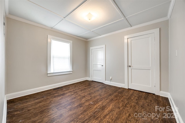 903 Rhode Island Ave, Kannapolis, NC 28083 - unfurnished bedroom featuring dark wood-style flooring and ornamental molding