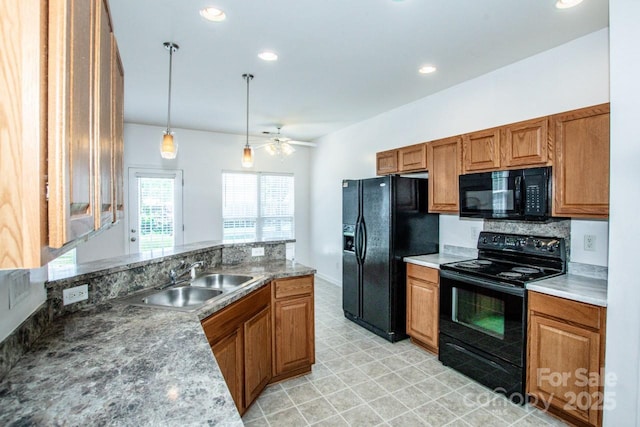 198 Devon Forest Dr, Mooresville, NC 28115 - kitchen with black appliances, brown cabinets, a ceiling fan, hanging light fixtures, and recessed lighting