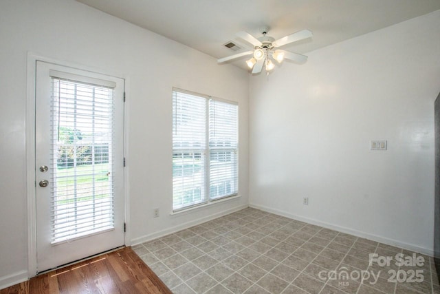 198 Devon Forest Dr, Mooresville, NC 28115 - doorway featuring ceiling fan and healthy amount of natural light