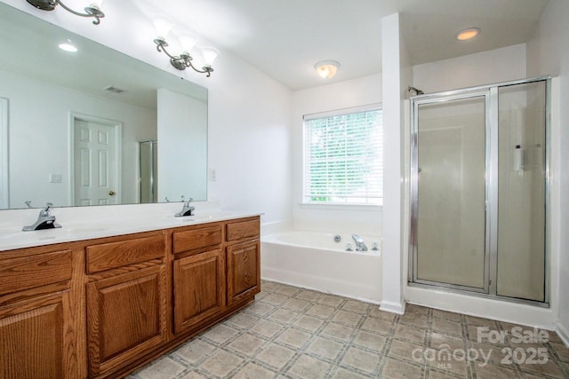 198 Devon Forest Dr, Mooresville, NC 28115 - bathroom with a shower stall, a garden tub, double vanity, and tile patterned floors