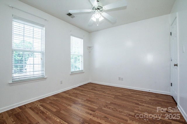 198 Devon Forest Dr, Mooresville, NC 28115 - empty room featuring wood finished floors and a ceiling fan