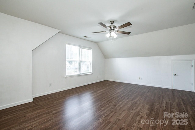 198 Devon Forest Dr, Mooresville, NC 28115 - additional living space featuring ceiling fan, dark wood-style floors, and vaulted ceiling