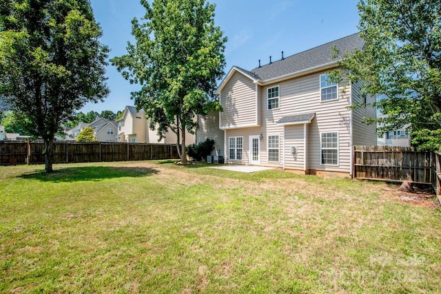198 Devon Forest Dr, Mooresville, NC 28115 - back of property with a fenced backyard and a patio