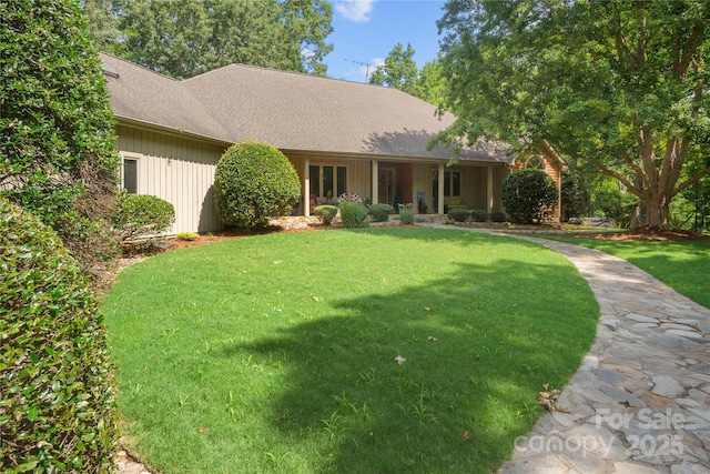 270 Foxwood Dr, Tryon, NC 28782 - single story home featuring a front lawn, a shingled roof, and a porch