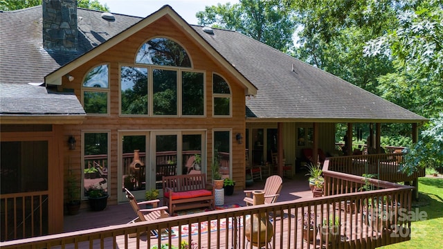 270 Foxwood Dr, Tryon, NC 28782 - rear view of house featuring a wooden deck, a shingled roof, a chimney, and outdoor lounge area